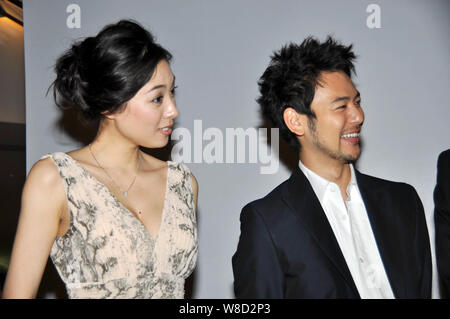 --FILE--Japanese actress Kazue Fukiishi, left, and actor Satoshi Tsumabuki attend a press conference for the opening of the Japanese Film Week during Stock Photo