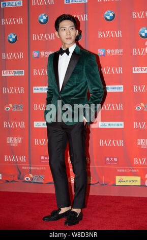 Chinese singer and actor Jing Boran arrives on the red carpet for the 2015 Bazaar Star Charity Night gala in Beijing, China, 23 September 2015. Stock Photo