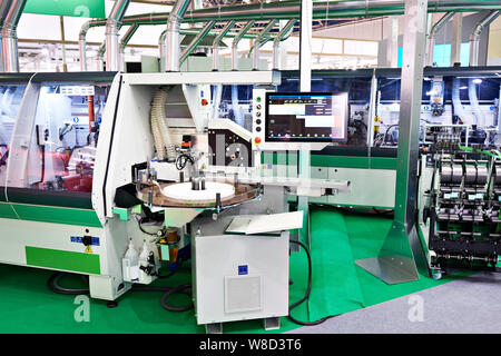 Industrial machines at a woodworking and furniture factory Stock Photo