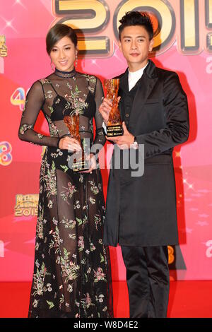 Hong Kong actress Linda Chung, left, and actor Bosco Wong pose with their trophies for the Mainland China's Favourite TVB Actress and Actor Awards dur Stock Photo