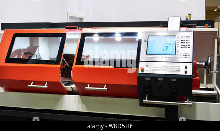 Universal Center Lathe with CNC system on plant Stock Photo