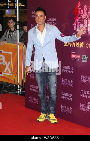 Chinese actor Simon Yam poses for photographers during a photo call for ...