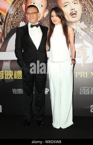 Taiwanese actress Shu Qi, right, and Chinese director and actor Jiang Wen pose during a premiere for their movie 'Gone with the Bullets' in Hong Kong, Stock Photo