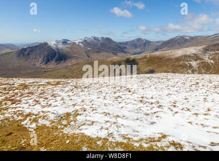Looking across the Ogwen Valley towards the snow capped Glyderau Ranges from the summit of Pen Llithrig Yr Wrach, Snowdonia National Park Stock Photo