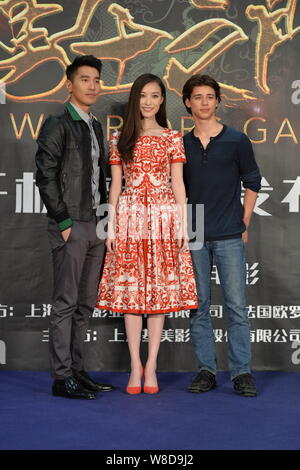 Chinese actress Ni Ni, center, and Taiwanese actor Mark Zhao, left, pose during a press conference for their new movie 'Warriors Gate' in Beijing, Chi Stock Photo