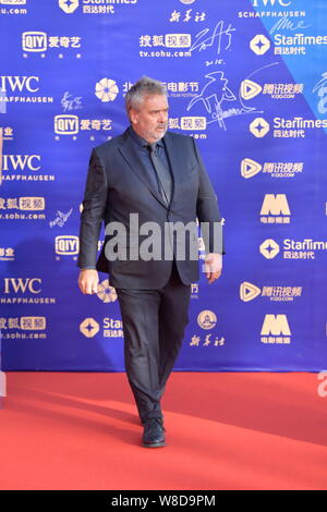 French director Luc Besson arrives at the red carpet for the 5th Beijing International Film Festival in Beijing, China, 16 April 2015. Stock Photo