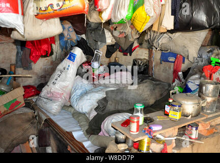 Interior view of the cellar of 58-year-old Chinese man Yu Fazhong, where he has been living alone for ten years, near Beiji Village (Arctic Village) i Stock Photo