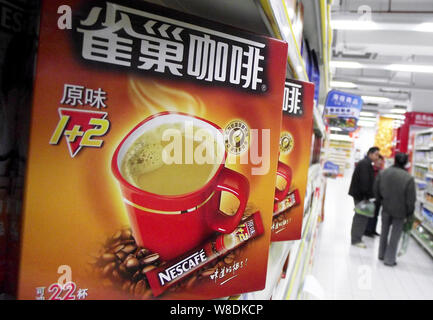 --FILE--Cartons of Nescafe instant coffee of Nestle are for sale at a supermarket in Nanjing city, east Chinas Jiangsu province, 12 April 2013.    To Stock Photo