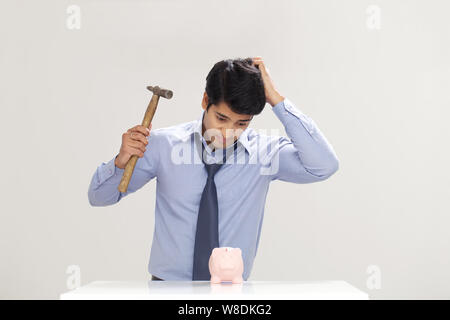 Businessman looking confused Stock Photo