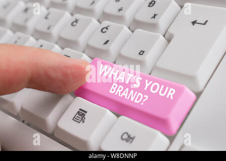 Handwriting text What S Your Brand Question. Conceptual photo asking about product logo does or what you communicate White pc keyboard with empty note Stock Photo