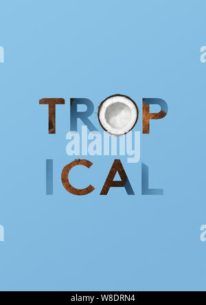 Word tropical with coconuts on blue background Stock Photo