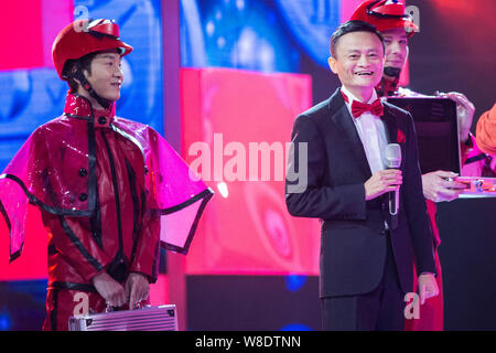 Jack Ma Yun, right, Chairman of Alibaba Group, smiles during the 2015 Tmall 11.11 Global Shopping Festival gala in Beijing, China, 10 November 2015. Stock Photo