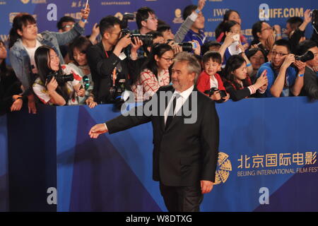 French director Luc Besson arrives on the red carpet for the closing ceremony of the Fifth Beijing International Film Festival in Beijing, China, 23 A Stock Photo