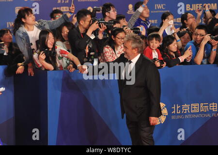 French director Luc Besson arrives on the red carpet for the closing ceremony of the Fifth Beijing International Film Festival in Beijing, China, 23 A Stock Photo