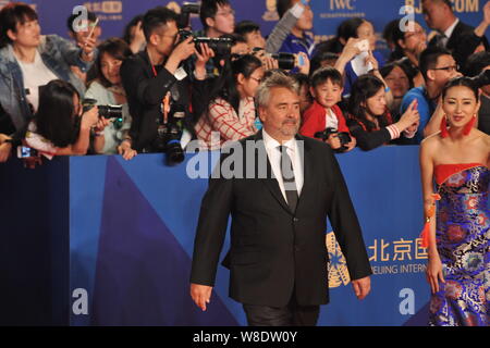 French director Luc Besson arrives on the red carpet for the closing ceremony of the Fifth Beijing International Film Festival in Beijing, China, 23 A Stock Photo