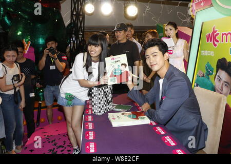 Singer and actor Ok Taec-yeon of South Korean boy group 2PM, right ...