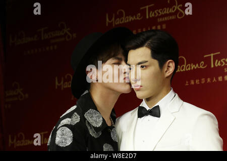 Chinese actor Kris Wu Yifan, left, whispers to Bulgarian-Canadian actress  Nina Dobrev during the press conference for the premiere of their movie  xXx Stock Photo - Alamy