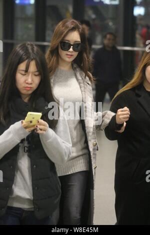 Singer and actress Seo Ju-hyun, better known by her stage name Seohyun, of South Korean girl group Girls' Generation walks to the exit after landing a Stock Photo