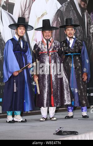(From left) South Korean actors Jang Hyuk, Lee Deok-hwa and Yu Oh-seong attend a press conference for their new TV drama 'The Merchant: Gaekju 2015' i Stock Photo