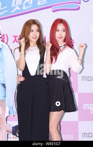 Park So-jin, left, and Kim Ah-young, better known by her stage name Yura, of South Korean girl group Girl's Day pose at a press conference for the gro Stock Photo