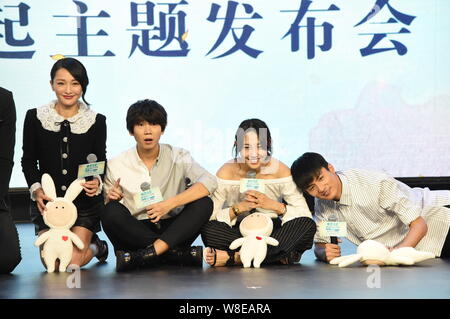 (From left) Chinese actress Zhou Xun, singer Bai Jugang, actress Bai Baihe and actor Liu Chang pose during a press conference for their movie 'A Journ Stock Photo