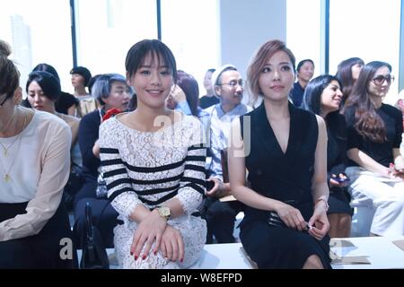 Chinese singer Zhang Liangying, right, and actress Sandra Ma Sichun, center, attend the Michael Kors fashion show during the New York Fashion Week Spr Stock Photo