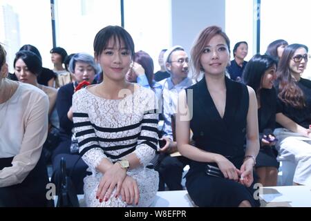 Chinese singer Zhang Liangying, right, and actress Sandra Ma Sichun, center, attend the Michael Kors fashion show during the New York Fashion Week Spr Stock Photo