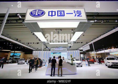 --FILE--People visit the stand of FAW during the 16th Shanghai International Automobile Industry Exhibition, also known as Auto Shanghai 2015, in Shan Stock Photo