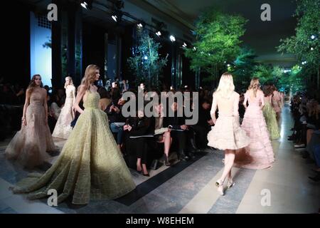 Model display new creations at the Elie Saab fashion show during the Paris Haute Couture Fashion Week Spring/Summer 2015 in Paris, France, 28 January Stock Photo