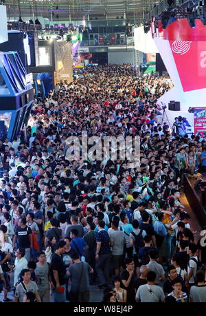 Visitors crowd the 13th China Digital Entertainment Expo, also known as ChinaJoy 2015, in Shanghai, China, 1 August 2015.   More than 273,000 people v Stock Photo