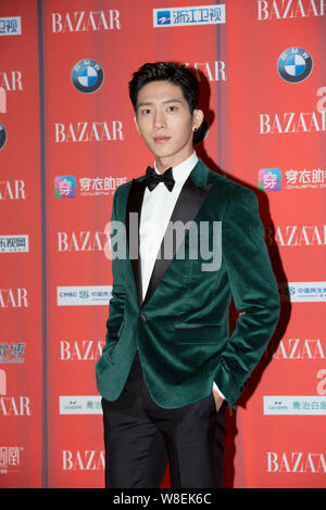 Chinese singer and actor Jing Boran arrives on the red carpet for the 2015 Bazaar Star Charity Night gala in Beijing, China, 23 September 2015. Stock Photo