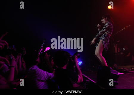 English singer Charlotte Emma Aitchison better known by her stage name Charli XCX, performs during her concert in Hong Kong, China, 20 April 2015. Stock Photo
