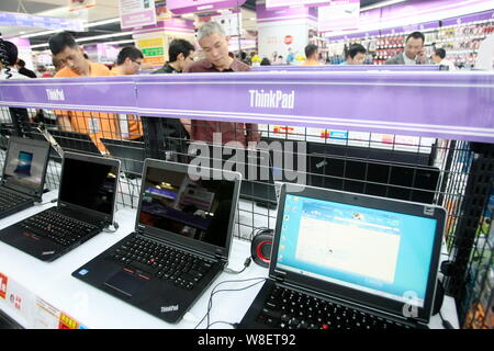 --FILE--ThinkPad laptop computers of Lenovo are for sale at the Laox flaship store in Shanghai, China, 25 May 2012.   Lenovo, China's leading personal Stock Photo