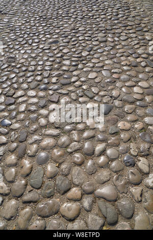 Stairs made of stones in a medieval city Stock Photo