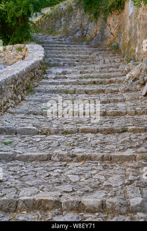 Stairs made of stones in a medieval city Stock Photo