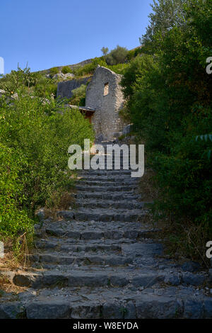 Stairs made of stones in a medieval city Stock Photo