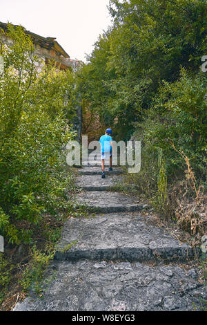 Stairs made of stones in a medieval city Stock Photo