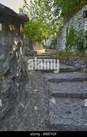 Stairs made of stones in a medieval city Stock Photo