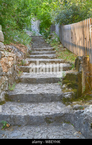 Stairs made of stones in a medieval city Stock Photo