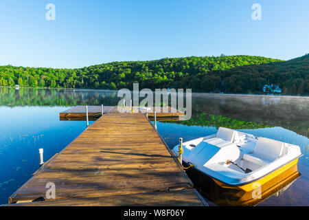 dock overlooking the quiet lake in the morning-3 Stock Photo