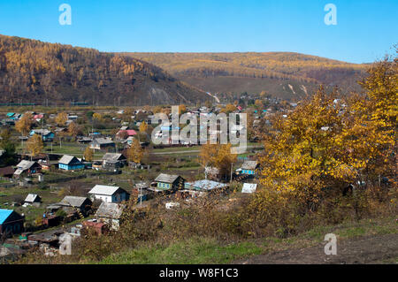 Siberia Russia, view of valley with village from train between Chita and Khabarovsk Stock Photo