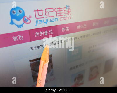 --FILE--A Chinese netizen browses the website of online dating site Jiayuan.com in Yunyang county, Chongqing, China, 22 July 2013.    Nasdaq-listed Ch Stock Photo