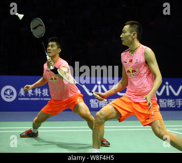 Fu Haifeng, right, and Zhang Nan of China compete against Hiroyuki Endo and Kenichi Hayakawa of Japan in their final match during the 2015 Sudirman Cu Stock Photo