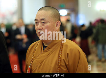 The Abbot of Shaolin Temple Shi Yongxin signing his book in London ...