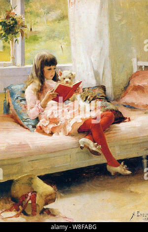 girl reading to a puppy Stock Photo