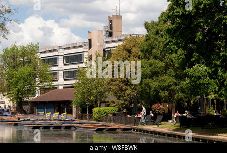 Punts moored on the River Cam in the city of Cambridge, England. Stock Photo