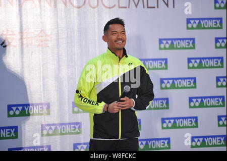 Chinese badminton player Lin Dan smiles during the Lin Dan & YONEX Cooperation Announcement in Beijing, China, 7 January 2015. Stock Photo