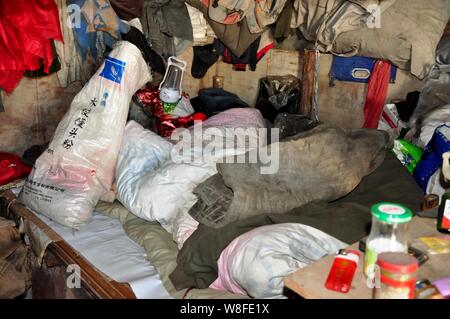 Interior view of the cellar of 58-year-old Chinese man Yu Fazhong, where he has been living alone for ten years, near Beiji Village (Arctic Village) i Stock Photo