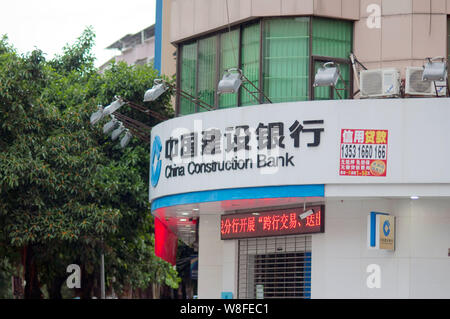 --FILE--View of a branch of China Construction Bank (CCB) in Heyuan city, south Chinas Guangdong province, 22 June 2015.   Beijing plans to scrap the Stock Photo