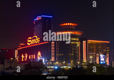 FILE--Night view of the Sands Macao Casino, owned by the Las Vegas Sands  Corporation, in Macao, China, 28 March 2015. It's been a while since inve  Stock Photo - Alamy